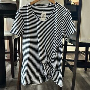 NWT women’s fun style tee with a bunched/knot look on left front. 100% cotton!